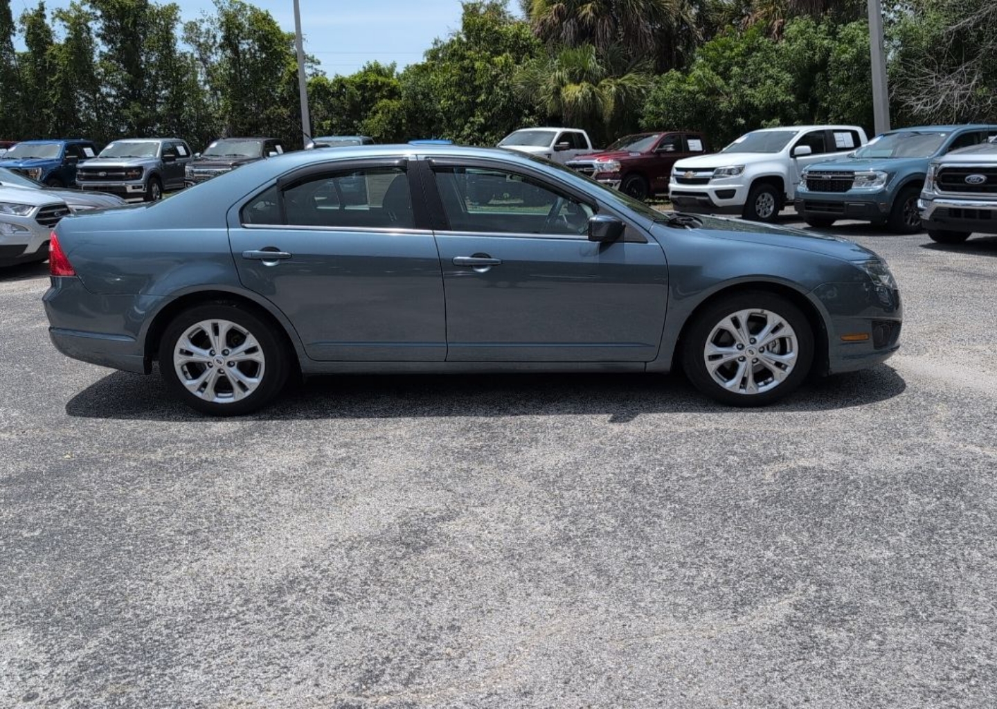 Used 2012 Ford Fusion SE with VIN 3FAHP0HA2CR255674 for sale in Englewood, FL