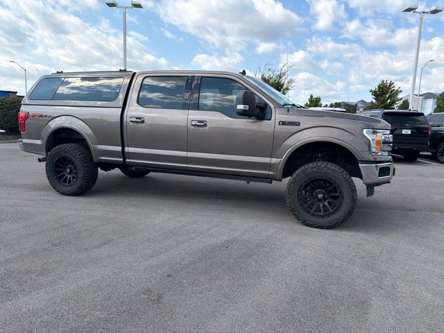 Used 2019 Ford F-150 Lariat with VIN 1FTFW1E45KKD72600 for sale in Kansas City