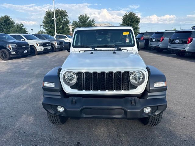 Used 2025 Jeep Wrangler 4-Door Sport S with VIN 1C4PJXDN6SW501145 for sale in Kansas City