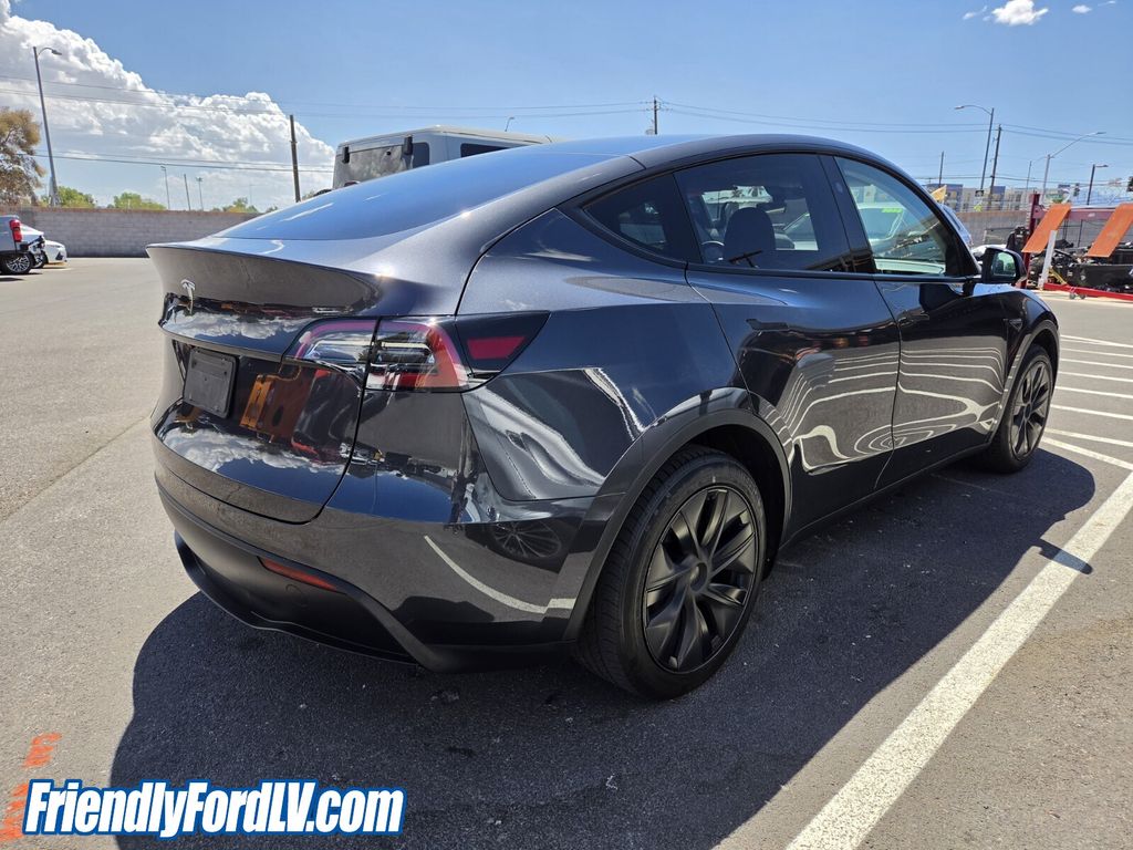 Used 2025 Tesla Model Y Long Range with VIN 7SAYGDED9SF313198 for sale in Las Vegas, NV