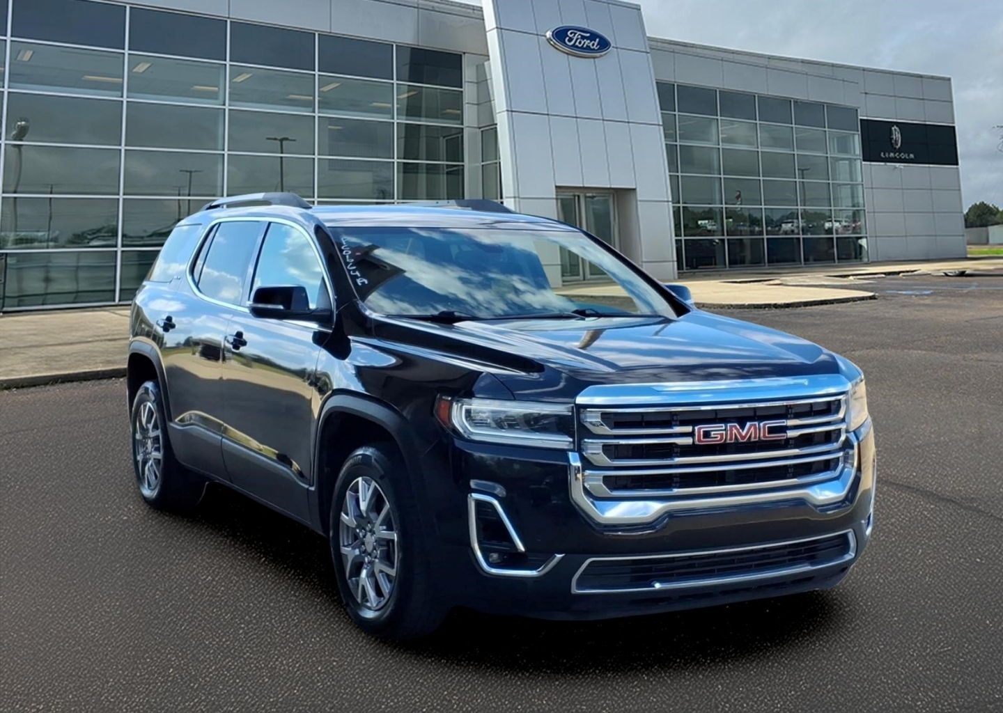 Used 2021 GMC Acadia SLT with VIN 1GKKNMLS4MZ158913 for sale in Grenada, MS