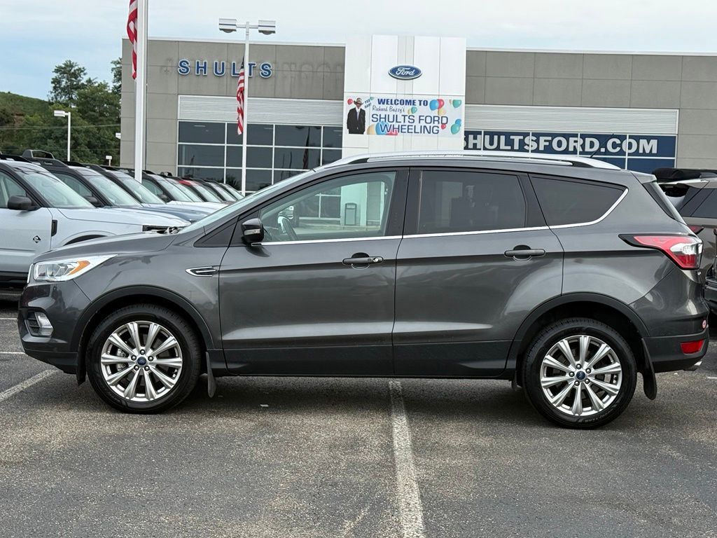 Used 2017 Ford Escape Titanium with VIN 1FMCU9J95HUF04188 for sale in Triadelphia, WV