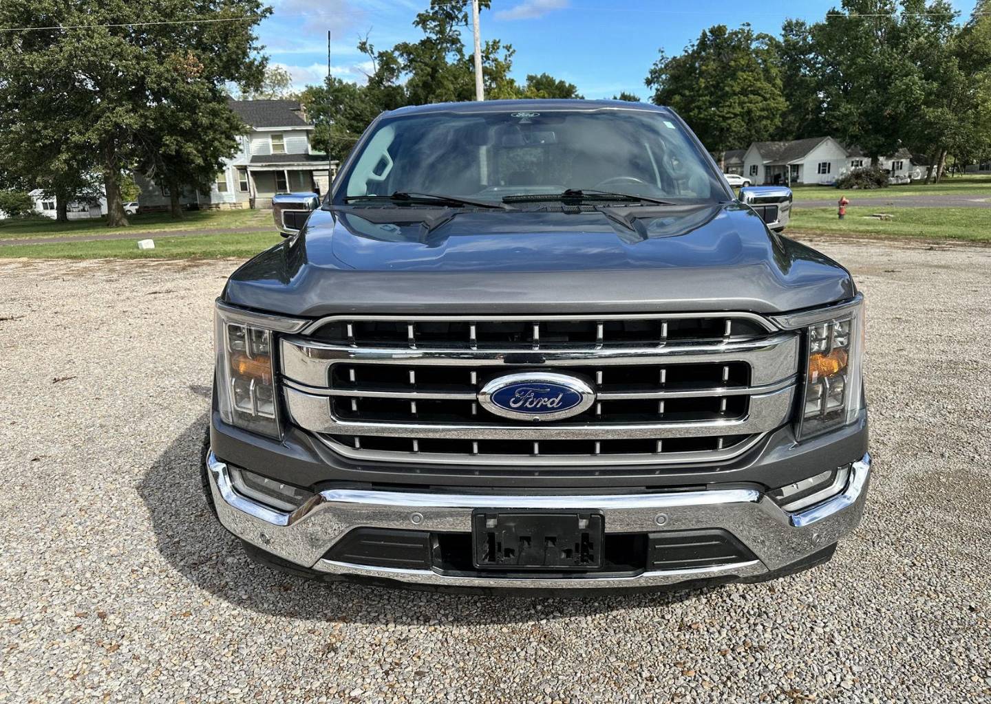 Used 2021 Ford F-150 Lariat with VIN 1FTFW1E82MFC31157 for sale in Kansas City