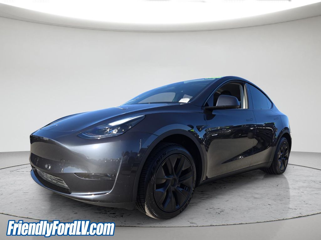Used 2025 Tesla Model Y Long Range with VIN 7SAYGDED9SF313198 for sale in Las Vegas, NV