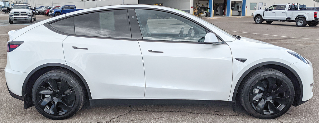 Used 2025 Tesla Model Y Long Range with VIN 7SAYGDEE2SF239387 for sale in Albuquerque, NM
