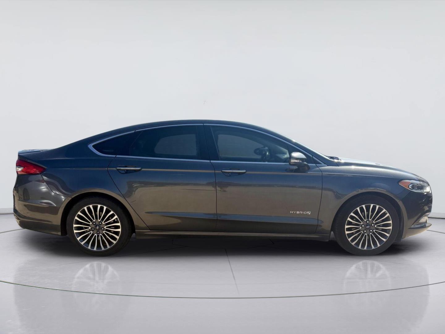 Used 2017 Ford Fusion Hybrid Titanium with VIN 3FA6P0RU9HR317577 for sale in San Antonio, TX