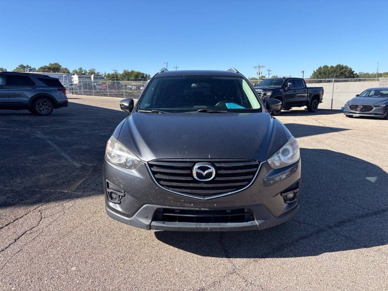 Used 2016 Mazda CX-5 Touring with VIN JM3KE2CY7G0797887 for sale in Kansas City