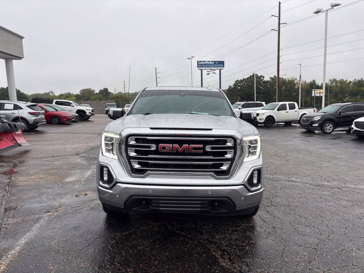 Used 2021 GMC Sierra 1500 SLT with VIN 3GTU9DEL8MG284352 for sale in Kansas City