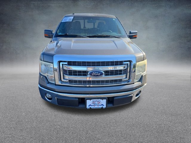 Used 2013 Ford F-150 XLT with VIN 1FTFW1CF4DKE51585 for sale in Dubuque, IA